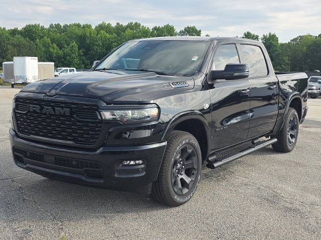2026 RAM 1500 Big Horn Crew Cab 4x4 5'7" Box in Black — front three-quarter view