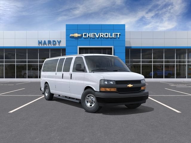 2026 Chevrolet Express Passenger 1LS in Summit White — front three-quarter view