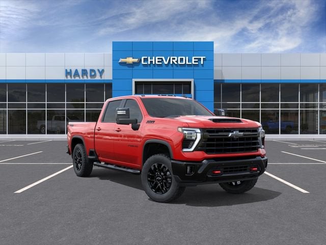 2026 Chevrolet Silverado 2500 HD LT in Red Hot — front three-quarter view