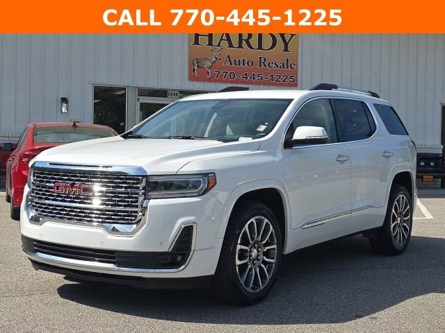 2023 GMC Acadia Denali in Summit White — front three-quarter view