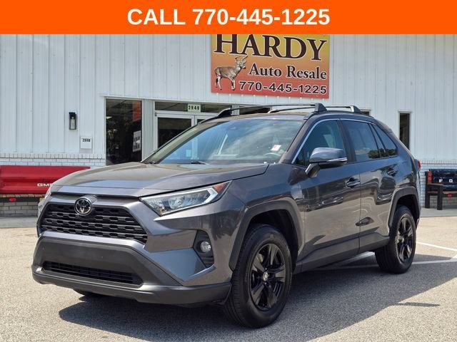 2021 Toyota RAV4 XLE in Gray — front three-quarter view