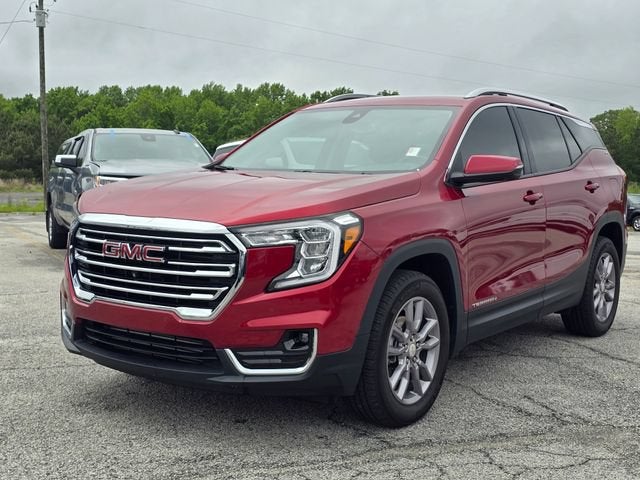 2024 GMC Terrain SLT in Volcanic Red Tintcoat — front three-quarter view