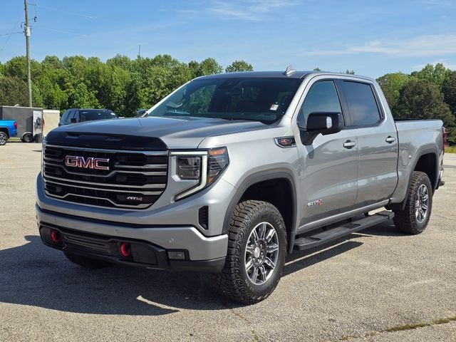 2026 GMC Sierra 1500 AT4 in Sterling Metallic — front three-quarter view