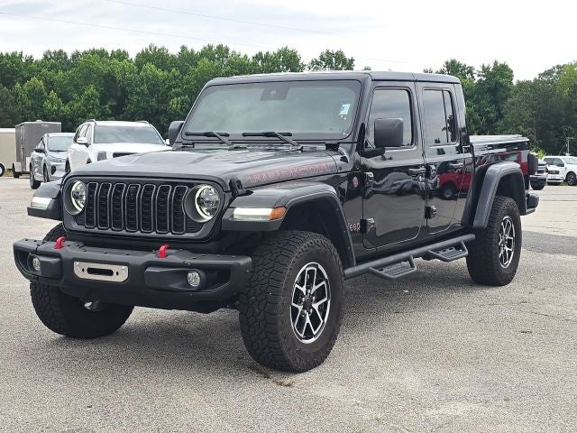 2024 Jeep Gladiator Rubicon in Black Clearcoat — front three-quarter view