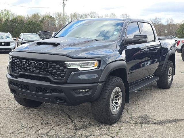 2025 RAM 1500 RHO in Forged Blue Metallic — front three-quarter view