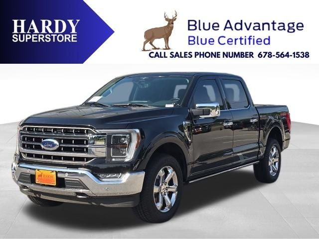 2023 Ford F-150 Lariat in Black Metallic — front three-quarter view