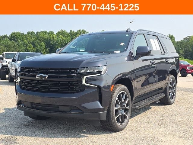 2023 Chevrolet Tahoe RST in Dark Ash Metallic — front three-quarter view