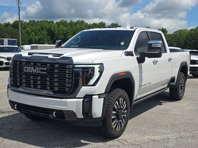 2024 GMC Sierra 2500HD Denali Ultimate in White Frost Tricoat — front three-quarter view