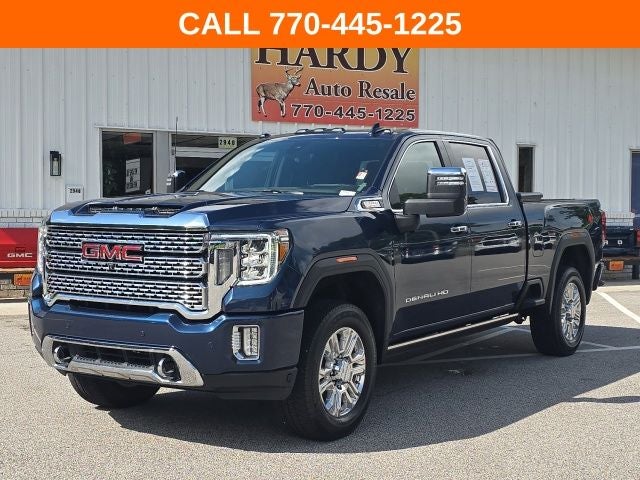 2021 GMC Sierra 2500HD Denali in Pacific Blue Metallic — front three-quarter view
