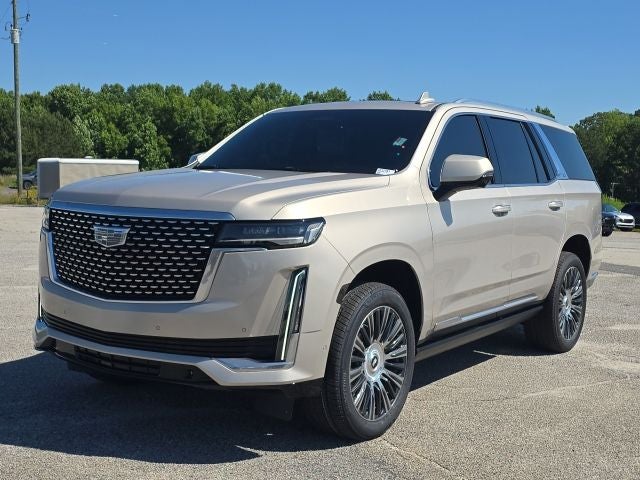 2021 Cadillac Escalade Premium Luxury in Sandstone Metallic — front three-quarter view