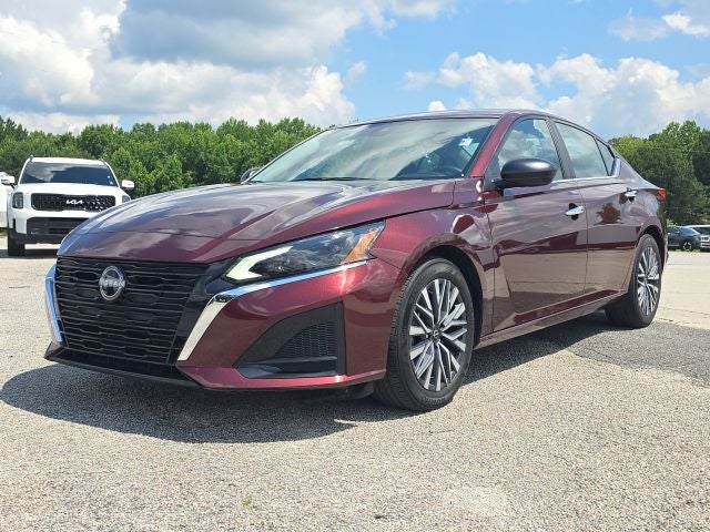 2025 Nissan Altima 2.5 SV in Garnet Pearl Metallic — front three-quarter view