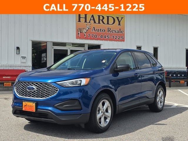 2023 Ford Edge SE in Blue Metallic — front three-quarter view