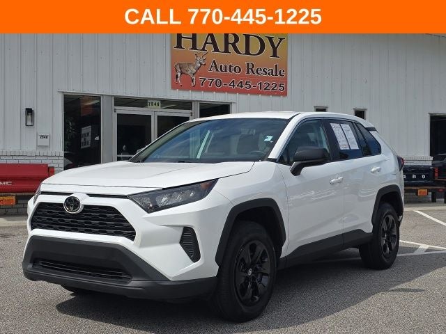 2022 Toyota RAV4 LE in White — front three-quarter view