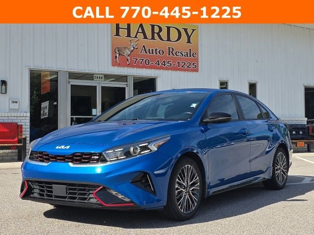 2024 Kia Forte GT-Line in Sporty Blue — front three-quarter view