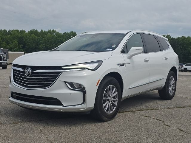 2023 Buick Enclave Essence in Summit White — front three-quarter view