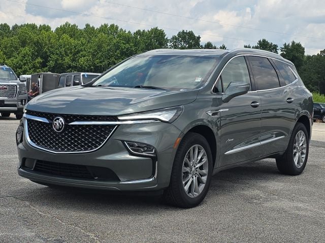 2023 Buick Enclave Avenir in Sage Metallic — front three-quarter view