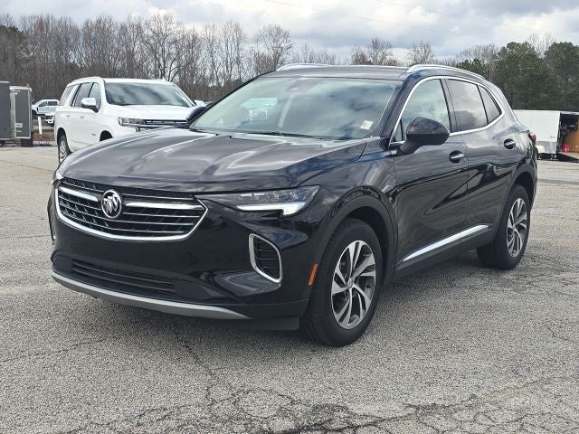 2023 Buick Envision Essence in Ebony Twilight Metallic — front three-quarter view