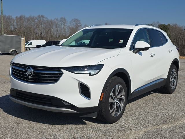2023 Buick Envision Essence in Summit White — front three-quarter view